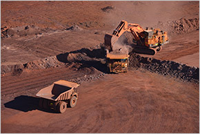 Roy Hill - trucks being loaded by excavator